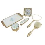 A 1960s dressing table set with alarm clock