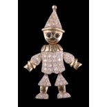 A late 20th Century diamond and sapphire articulated clown pendant, the 9 ct gold body clothed