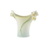 A late 20th Century vase by Franz, decorated with relief moulded lilies, 29 cm