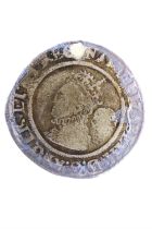 An Elizabeth I silver sixpence coin, third/fourth issue, lion Tower Mint mark