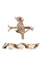 A seed pearl set 9 ct yellow metal bird brooch, having a paste eye, and a 9 ct gold pearl brooch,