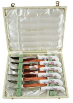 A boxed set of Royal Crown Derby China handled knives having floral decoration, 18 cm