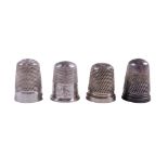Four silver and white metal thimbles, including J Forest, Birmingham, 1907 and 1919, Samuel Foskett,
