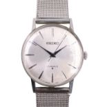 A vintage Seiko stainless steel wristwatch, having a crown-wound 17 jewel movement, brushed silver