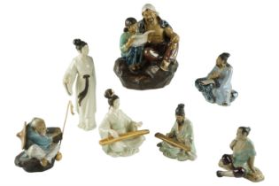 A group of Chinese Shiwan figurines, late 20th Century, tallest 21.5 cm