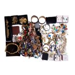 A large quantity of costume jewellery including necklaces, demi parure sets, bracelets, earrings,