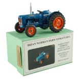 A boxed Brian Norman Farm Miniatures Fordson Dexta (FM 06) diecast model tractor, with signed and