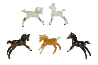 Five diminutive Beswick foals, tallest 8.5 cm