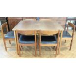 A 1960s Macintosh teak extending dining table and six chairs, all bearing maker's labels, the chairs