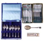 A small quantity of electroplate including a berry spoon, grapefruit and teaspoons, and two boxed