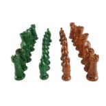 A set of mid-20th-Century rust orange and green ceramic chess pieces, king 10.5 cm