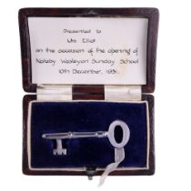 A cased presentation key, presented to Mrs Elliot to commemorate the opening of Nateby Wesleyan