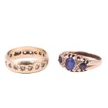 A vintage 9 ct gold eternity ring set with white brilliants and a sapphire and diamond finger ring