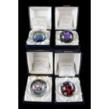 Four Caithness paperweights, Snow Flower, Moonflower, Damson Floral Mountain and Plough, boxed