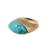 A 1970s turquoise and 18 ct yellow metal finger ring, the navette shaped cabochon set in a