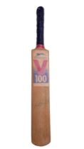 A miniature Slazenger V100 cricket bat bearing an autograph signature, 38 cm