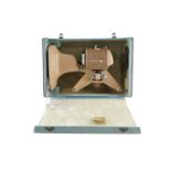 A cased 1950s Italian Nilus 8 mm projector, projector 37.5 cm high