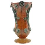 An early 20th Century Palissy style majolica lizard vase, of lobed section and bearing lizards and