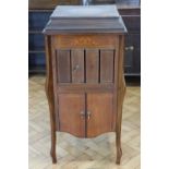 An early 20th Century marquetry inlaid mahogany floor-standing gramophone, bearing retailer's