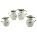 A graduated set of four Coalport The Caughley Mask-Head Jugs, tallest 19 cm