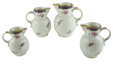 A graduated set of four Coalport The Caughley Mask-Head Jugs, tallest 19 cm