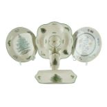 Four Spode Christmas plates, boxed, together with a similar Spode Christmas tree vase, 17 cm tall