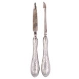 Two Edwardian silver-handled manicure tools, decorated with bright-cut foliate scrolls, and engraved