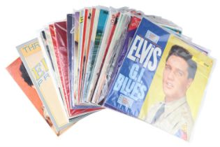 A quantity of Elvis Presley vinyl records, including G I Blues, Images, etc