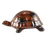 A 1950s Arthur Wood ceramic turtle money box, 8 x 19 cm