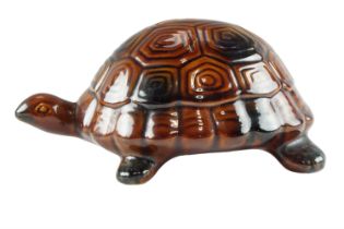 A 1950s Arthur Wood ceramic turtle money box, 8 x 19 cm