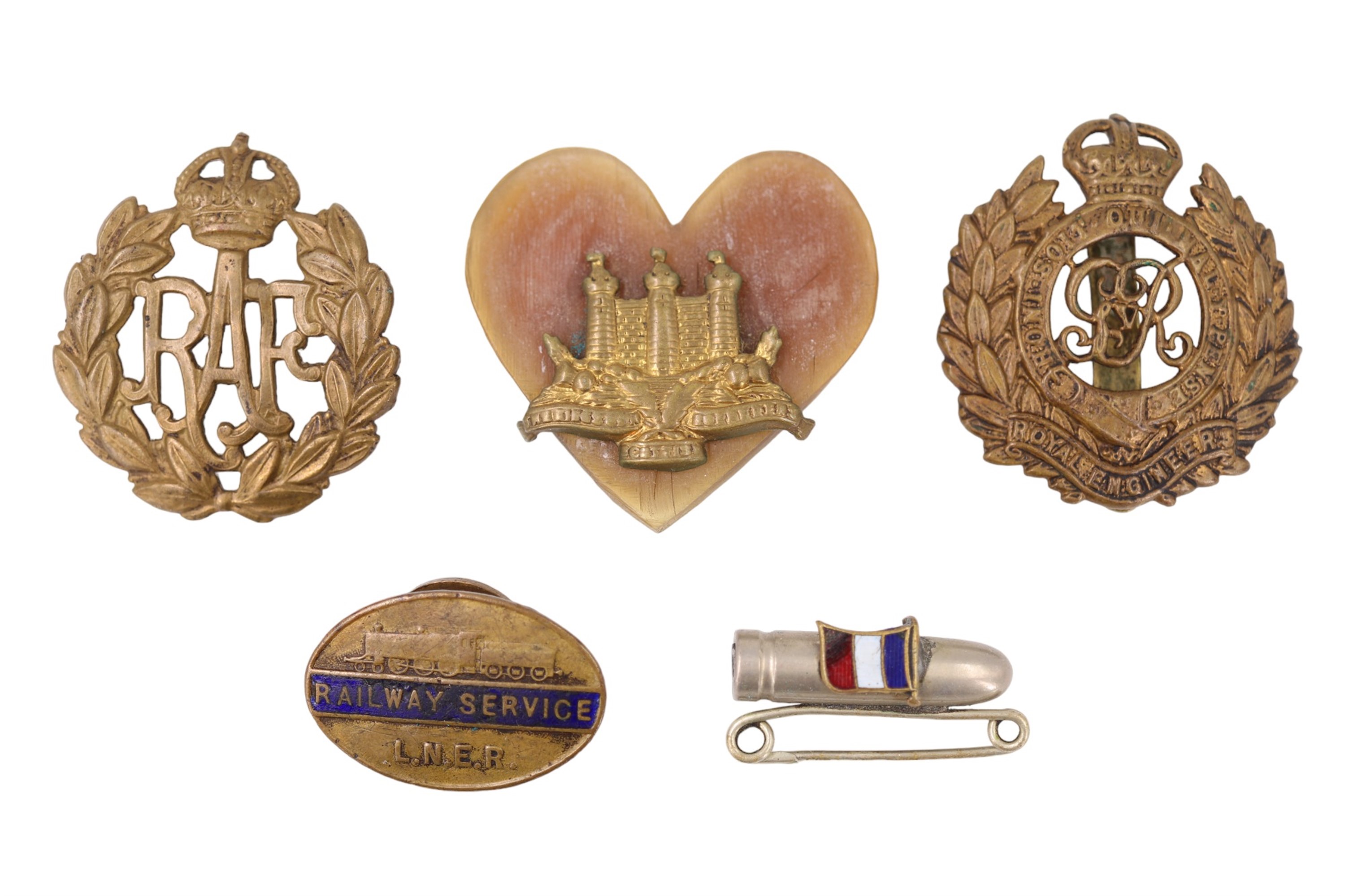 A Great War sweetheart / patriotic brooch being a bullet faced with an enamelled French tricolour