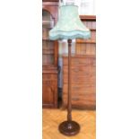 A mid-to-late 20th Century mahogany standard lamp, 158 cm to top of lamp holder