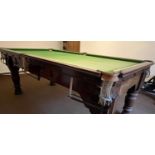 A late 19th / early 20th Century three-quarter sized slate-bed billiards / snooker table. [Important