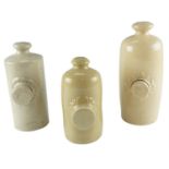 Three stoneware hot water bottles