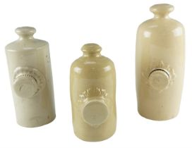 Three stoneware hot water bottles