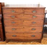 A late Georgian cross-banded mahogany chest of two over three drawers, having having box and ebony