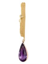 A peardrop amethyst pendant necklace, the 26 x 13 mm pear shaped amethyst bezel set in yellow metal,