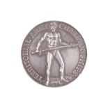 An Omar Ramsden cased silver Territorial Army Championships Medal, obverse an athlete holding a