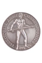 An Omar Ramsden cased silver Territorial Army Championships Medal, obverse an athlete holding a