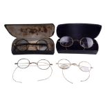 Four pairs of vintage spectacles, including two pairs with bi-focal lenses