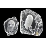 A Mats Jonasson of Sweden glass intaglio owl ornament together with a similar example by Goebel,