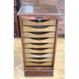 A George V oak tambour front stationary cabinet, 48 x 42.5 x 99 cm