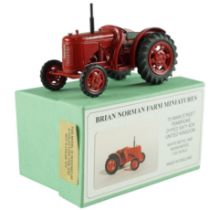 A boxed Brian Norman Farm Miniatures David Brown Cropmaster (FM 05) diecast model tractor, with