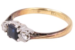 A diamond and sapphire finger ring, having a 4 mm square cut blue sapphire between two 3 mm