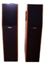 A pair of Tannoy Precision P30 Cherry floor-standing column speakers, having a three way infinite