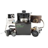 A Polaroid Colourpack 100 Land Camera, an Exakta II Jhagee Dresden 35mm film camera and Minolta