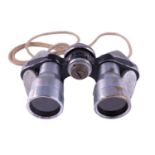 A pair of mid 20th Century Plum 8 x 20 compact binoculars