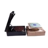 A His Masters Voice portable gramophone and records