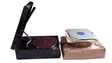 A His Masters Voice portable gramophone and records
