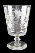A large mid-to-late 20th Century stemmed glass vase, decorated with wheel-cut stylized flora and